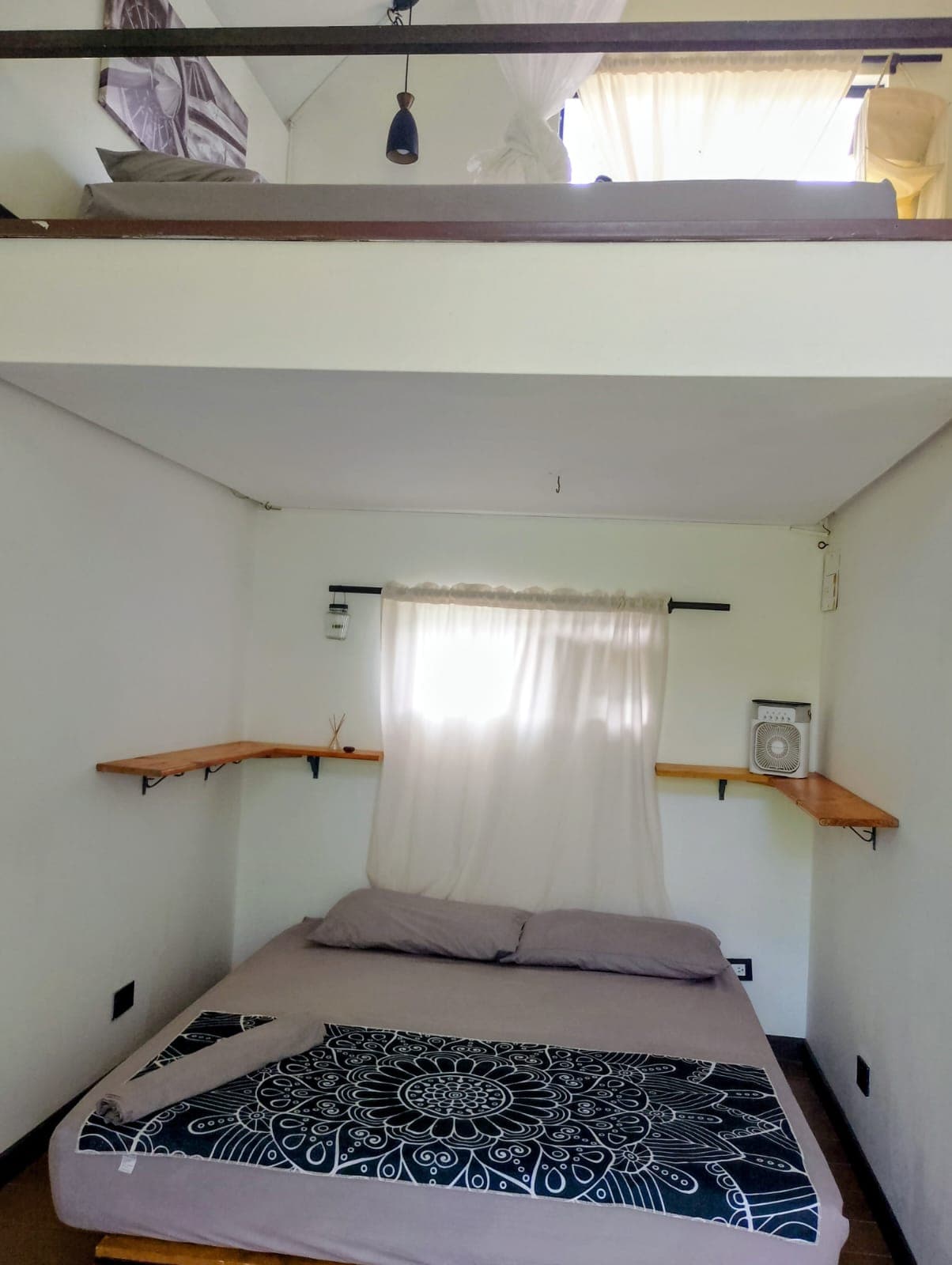 Lower queen bed and loft
