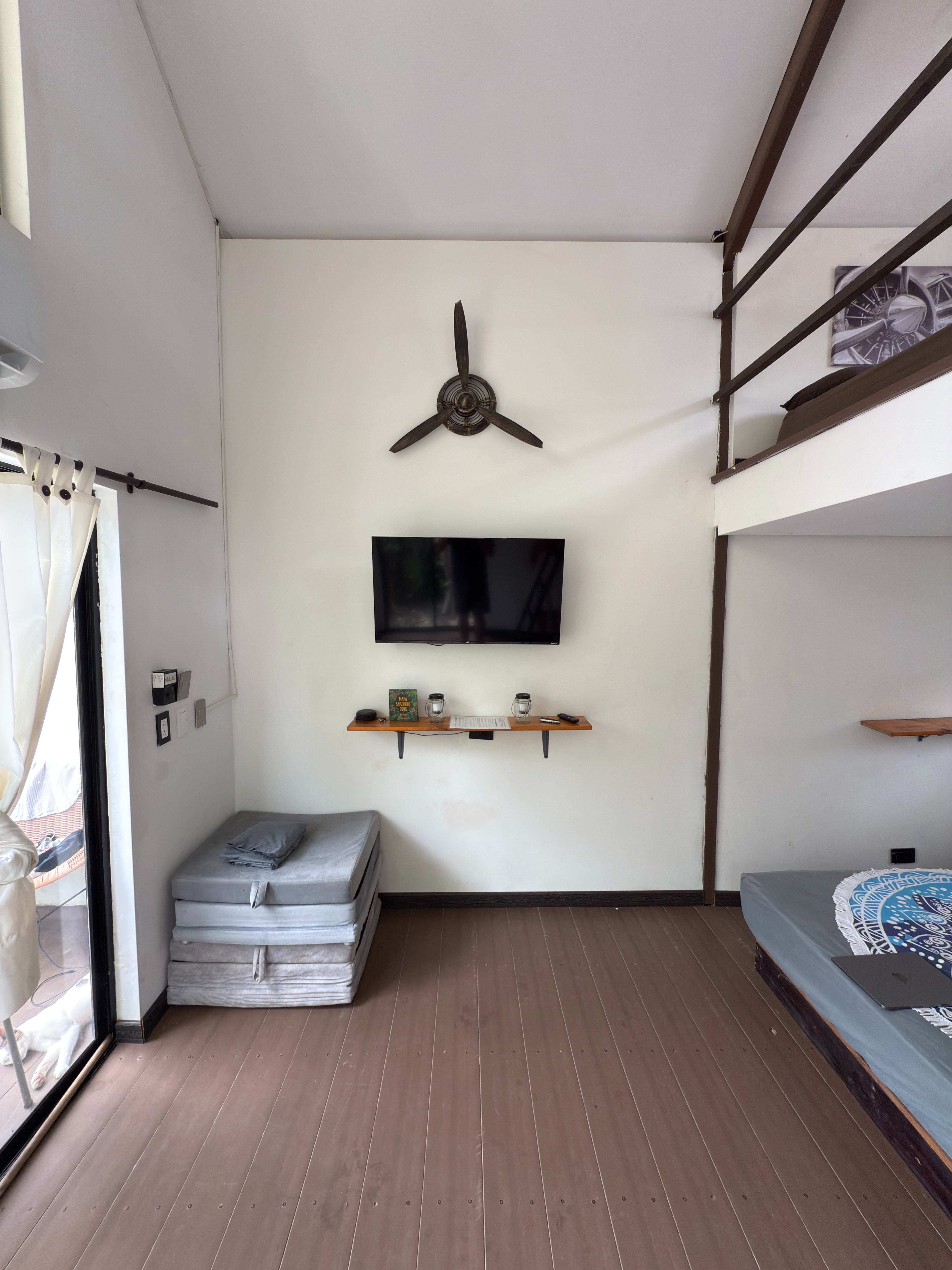 The Captain's Cabin — room with aviation decor